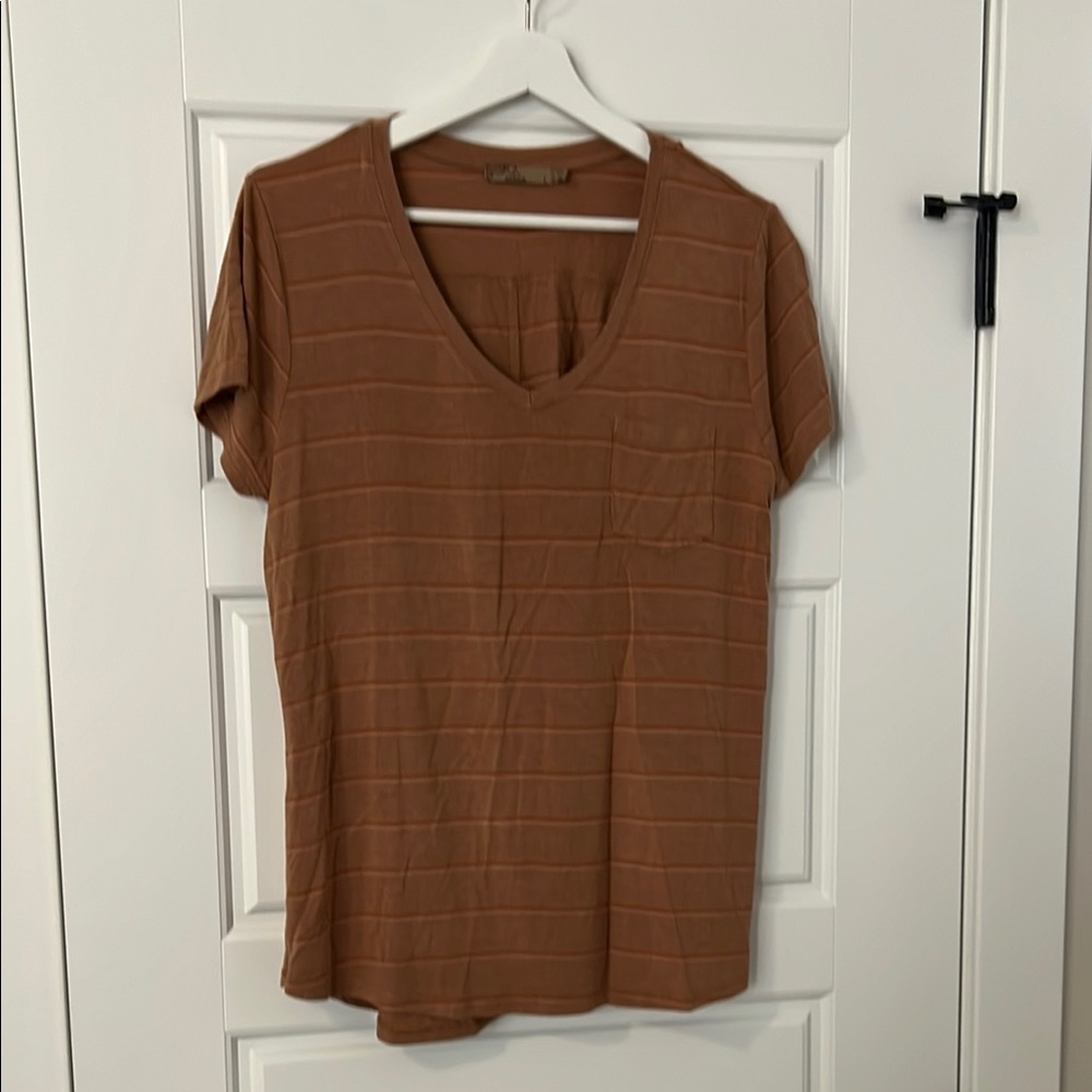 Prana rich brown with yellow/orange subtle stripes. Large Tshirt